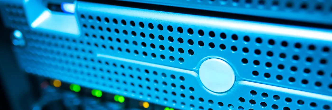 The front of a rack mounted server with lit status indicators.